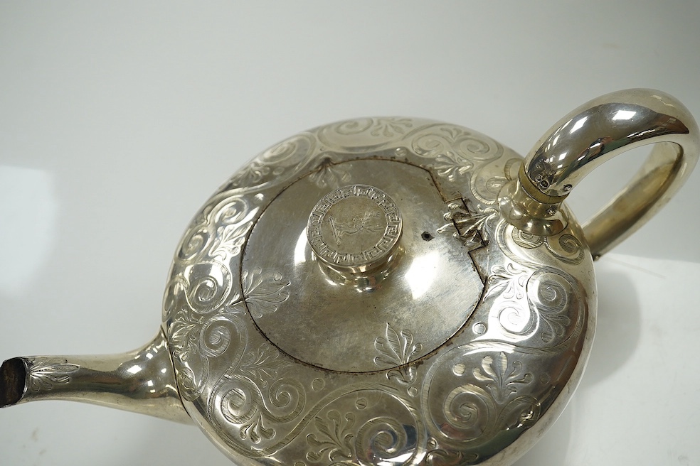 A Victorian silver bachelor's squat circular teapot, indistinct maker's mark, London, 1845, gross weight 13.8oz. CITES Submission reference XJ224VHB. Condition - fair